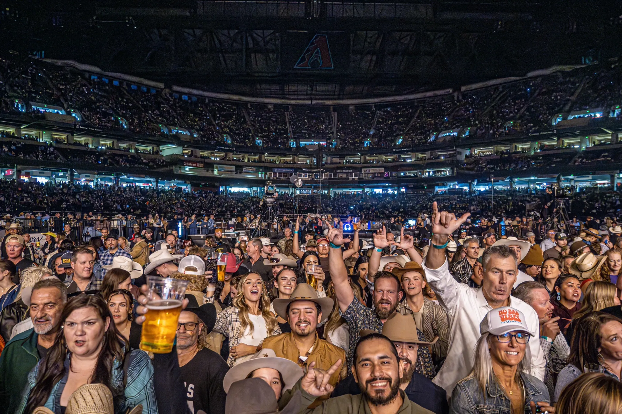 Packed crowd on the field at Chase Field during a Hondo Rodeo Fest concert